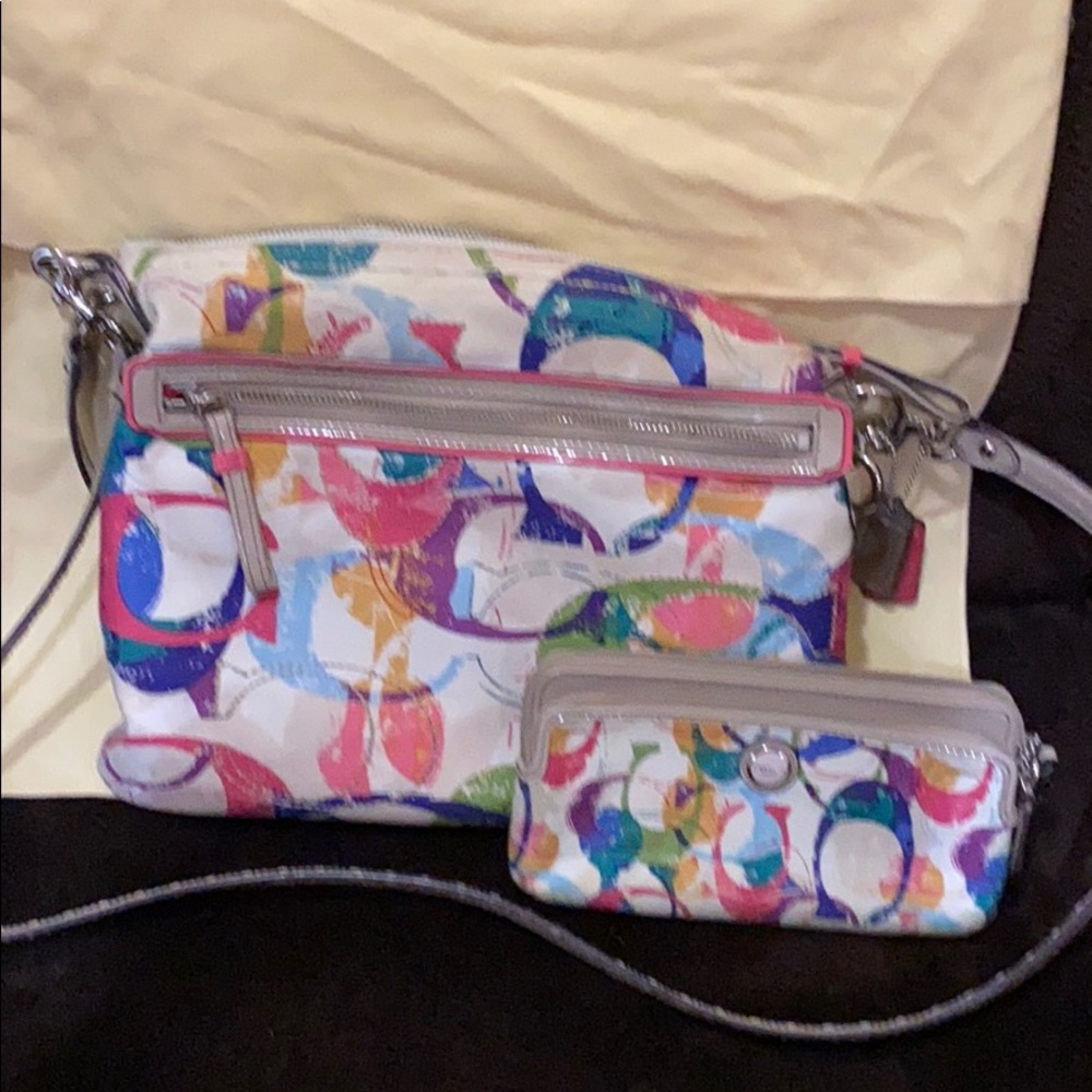 A Coach purse with matching Coach wristlet wallet